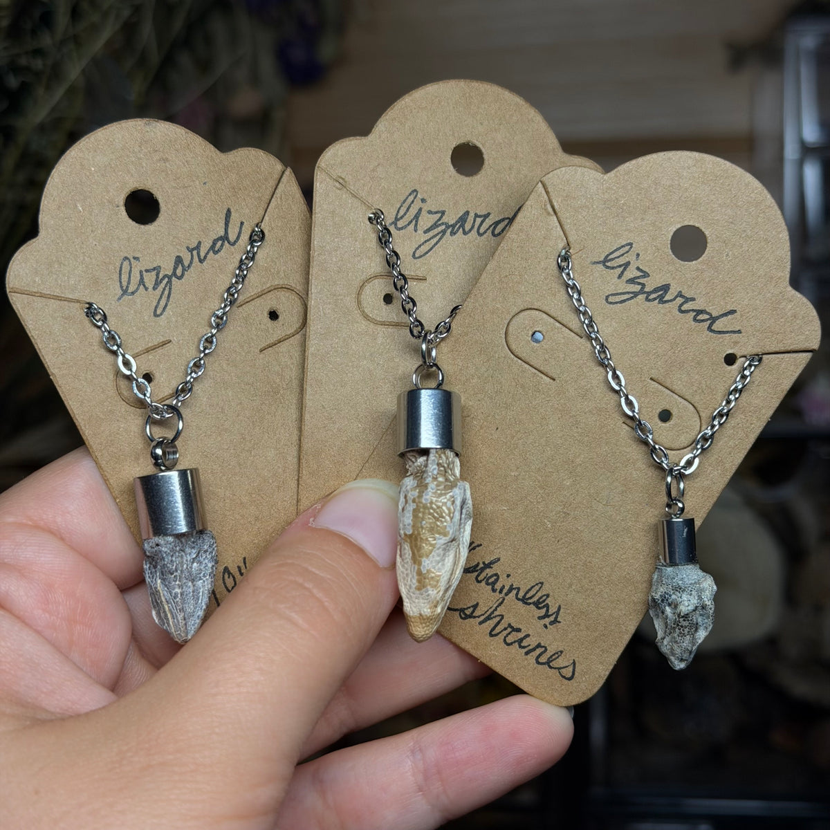 lizard head necklaces